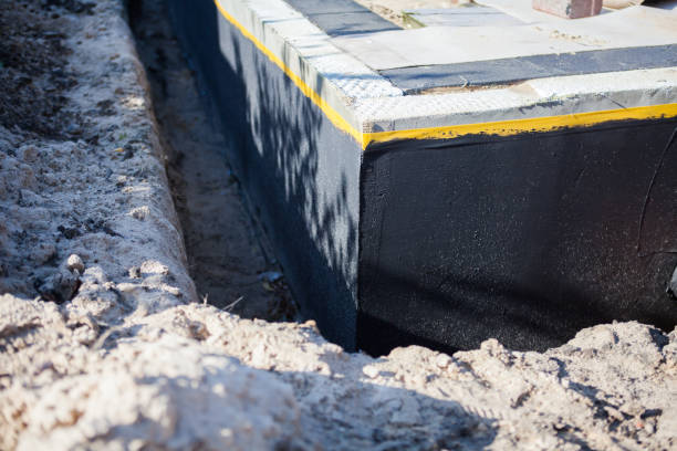 Professional Basement Waterproofing technician working in Cleveland, NC